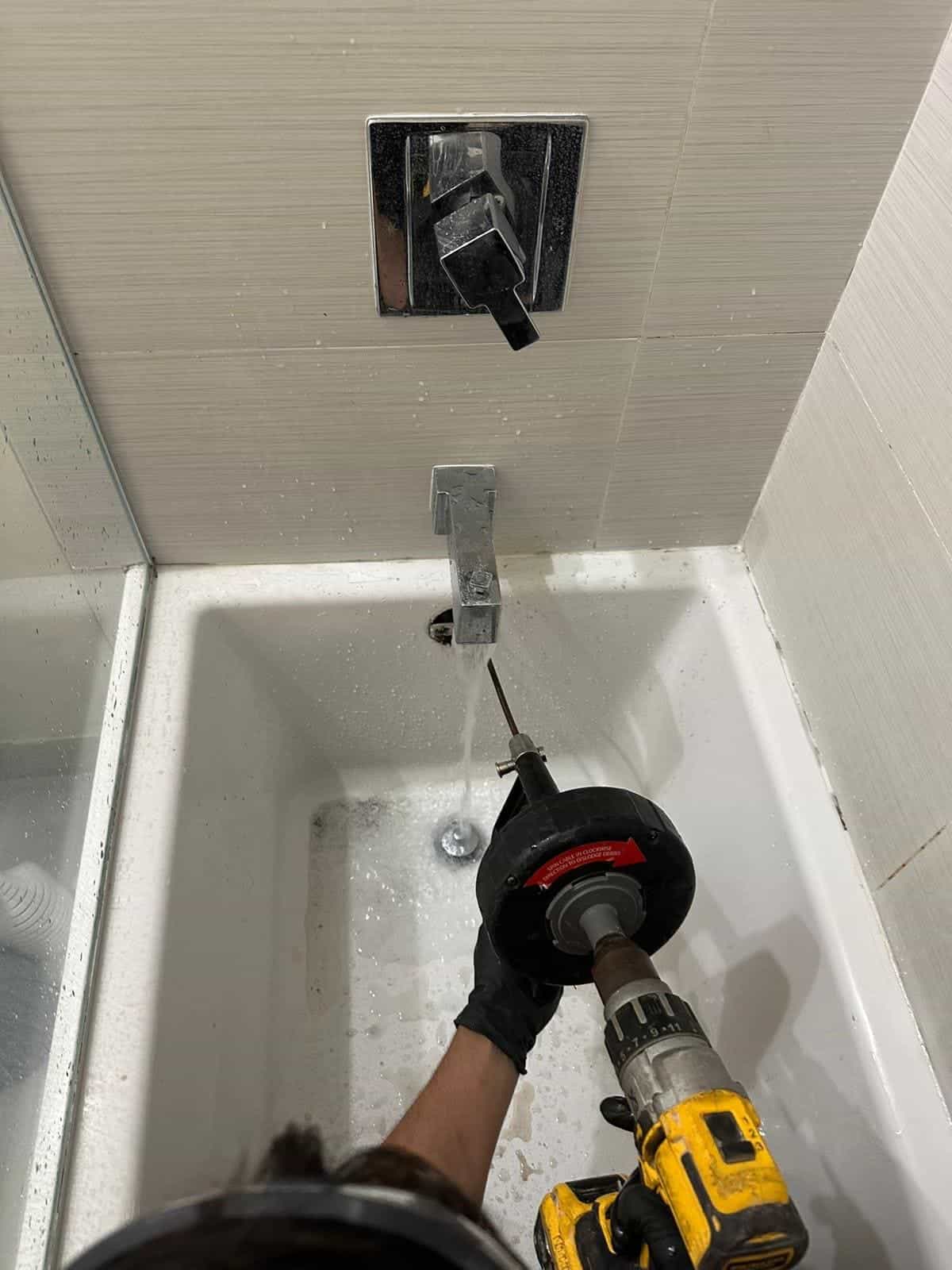 Before and after of a Drain cleaning by a plumber in Kendall