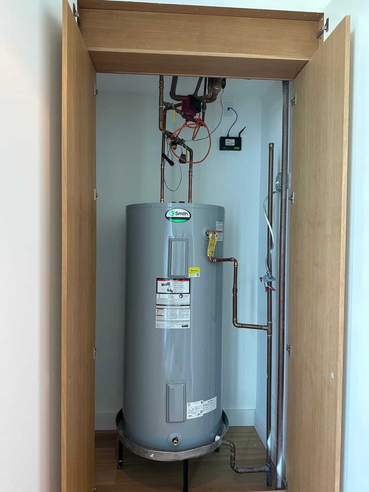 Before and after of a Water Heater by a plumber in Kendall
